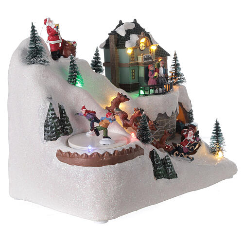 Cenário natalino em miniatura aldeia com Pai Natal no trenó, comboio e pista de gelo, luzes LED e música, 20x26x17 cm 4