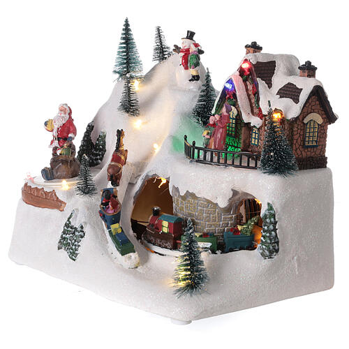 Cenário natalino em miniatura aldeia com comboio, trenó com cavalo e Pai Natal com presentes, luzes LED e música, 20x26x17 cm. 4