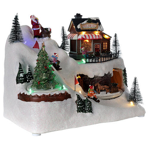 Cenário natalino em miniatura aldeia com crianòas brincando, boneco de neve e luzes LED e música, 20x26x17 cm 4