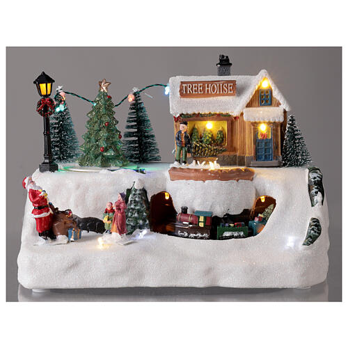 Aldeia natalina em miniatura árvore de Natal, Pai Natal e comboio, luzes LED  e música, 21x29x19 cm | venda online na HOLYART