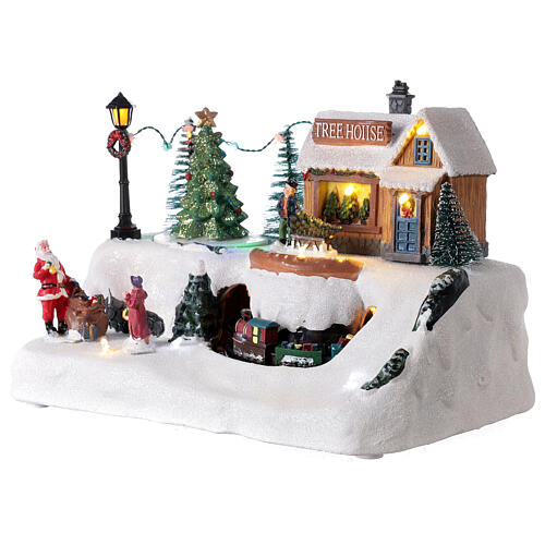 Aldeia natalina em miniatura árvore de Natal, Pai Natal e comboio, luzes LED e música, 21x29x19 cm 3