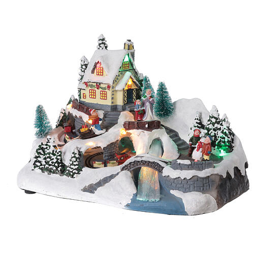 Weihnachtliche Szene Dorf mit Zug Lichtern und Musik, 20x30x20 cm 3