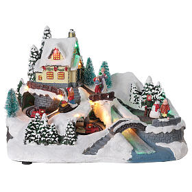Scène Noël village train rivière éclairée musique 20x30x20 cm