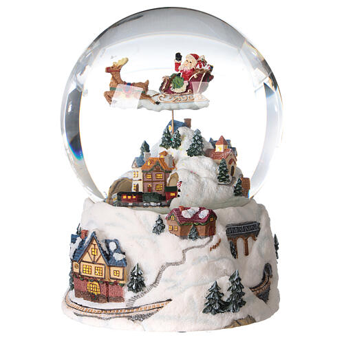 Bola de vidrio nieve purpurina pueblo navideño 12 cm 2