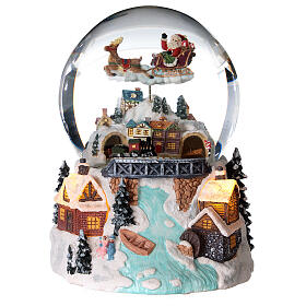 Bola de vidrio nieve purpurina pueblo navideño con río 12 cm