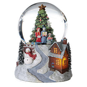 Glass ball snow glitter Christmas tree and house with snowman