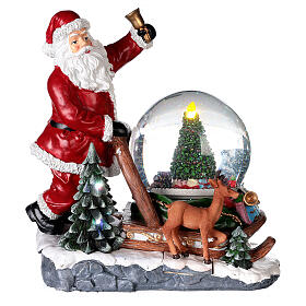 Glass ball snow glitter Father Christmas with toboggan