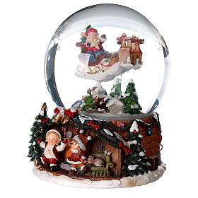 Bola de vidrio Papá Noel y renos 15 cm