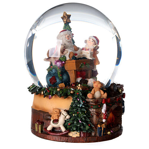 Sfera di vetro neve con Babbo Natale e giocattoli 15 cm 3