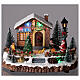 Pueblo navideño Papá Noel y hoguera luces música 25x15x20 cm s2