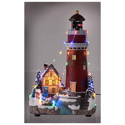 Village de Noël 30x18x15 cm phare lumineux mouvement piles 2