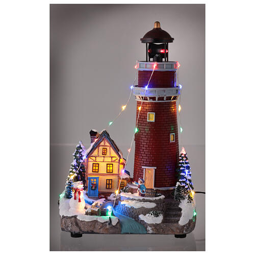 Christmas village lighthouse animated 30x18x15 cm battery powered 2