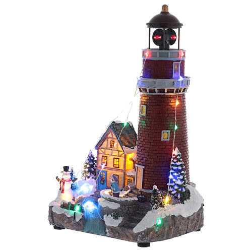 Christmas village lighthouse animated 30x18x15 cm battery powered 3