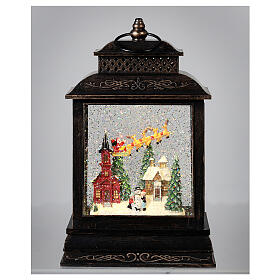 Squared glass lantern, Santa on his sleigh, LED lights and snow, 30x18x10 cm