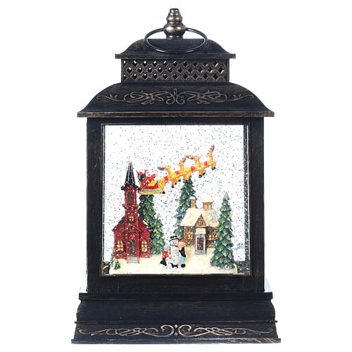Squared glass lantern, Santa on his sleigh, LED lights and snow, 30x18x10 cm 1