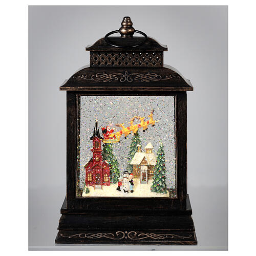 Squared glass lantern, Santa on his sleigh, LED lights and snow, 30x18x10 cm 2