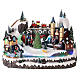 Christmas village 20x35x25 cm animated Christmas tree and skaters, batteries or electricity s1