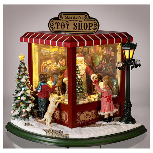 Cenário natalino em miniatura loja de brinquedos Pai Natal pilhas e corrente 37x33x33 cm 2