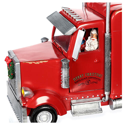 Camión rojo Papá Noel 65x25x15 cm tren movimiento corriente  4