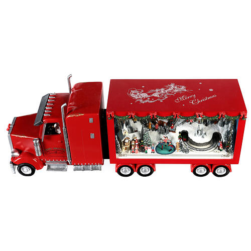 Camión rojo Papá Noel 65x25x15 cm tren movimiento corriente  9