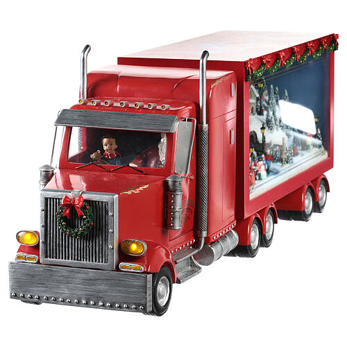 Camion rouge Père Noël 65x25x15 cm train en mouvement courant électrique 8