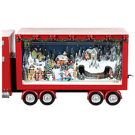 Ciężarówka czerwona święty Mikołaj 65x25x15 cm pociąg ruch prąd elektryczny