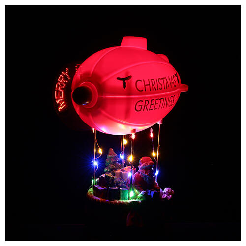 Dirigeable Père Noël 30x25x10 cm LEDs 5
