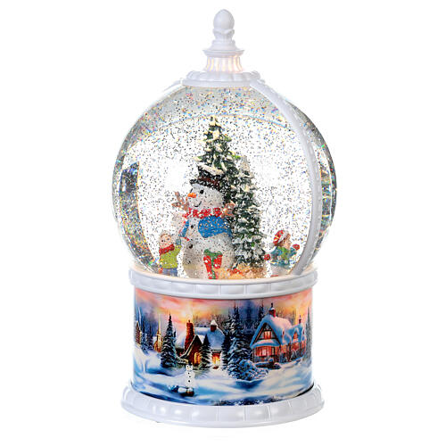 Snow globe with snowman 30 cm, LED and snow, children in motion, battery 3
