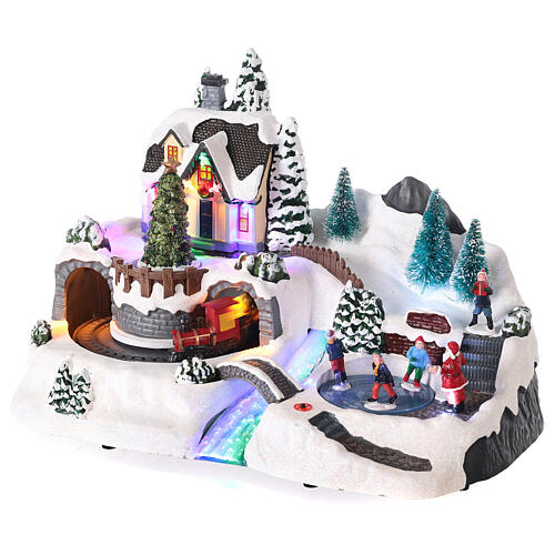 Pueblo de Navidad con movimiento y luces led 30x35x20 cm 3