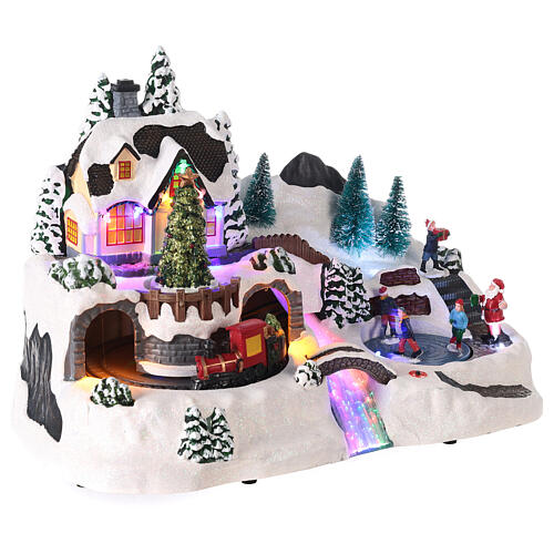 Pueblo de Navidad con movimiento y luces led 30x35x20 cm 4