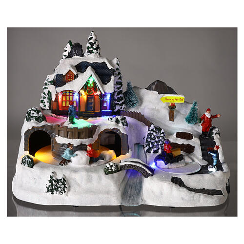 Villaggio natalizio bambini in movimento luci led 25x35x20 cm  2