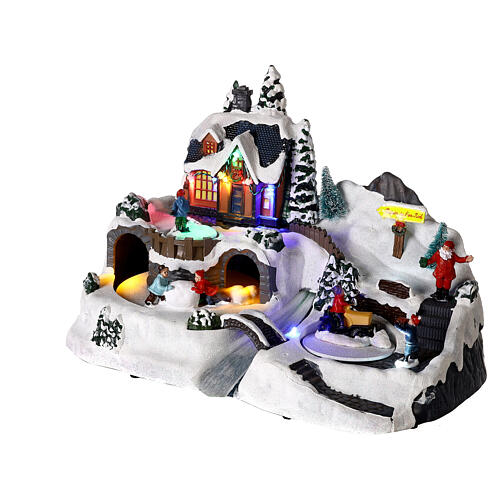 Villaggio natalizio bambini in movimento luci led 25x35x20 cm  3