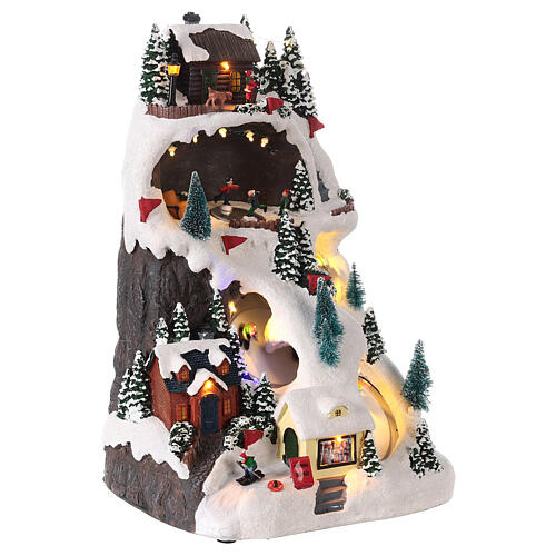Christmas village set, mountain with skiers in motion, LED lights, 40x25x20 cm 4