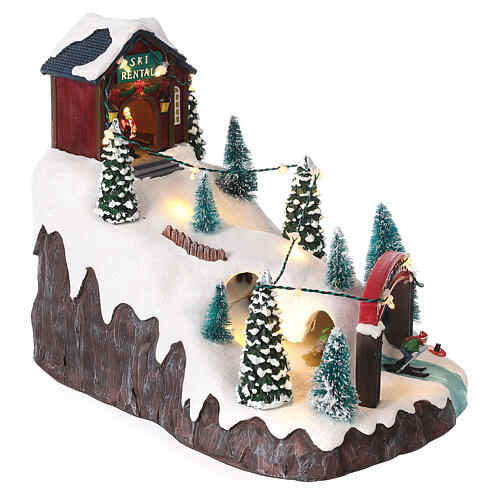 Aldeia de Natal em miniatura montanha com esquiadores movimento luzes LED 21x17,5x26 cm 4