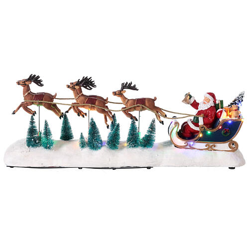 Snowy Santa's sleigh with reindeers in motion, LED lights, 25x60x15 cm 1