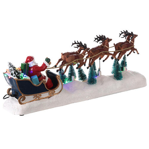 Traîneau Père Noël neige rennes mouvement lumières LED 25x60x15 cm 5
