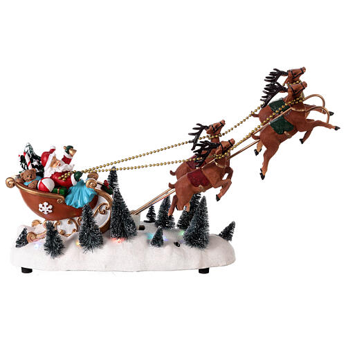 Snowy Santa's sleigh with flying reindeers, LED lights, 35x45x15 cm 1
