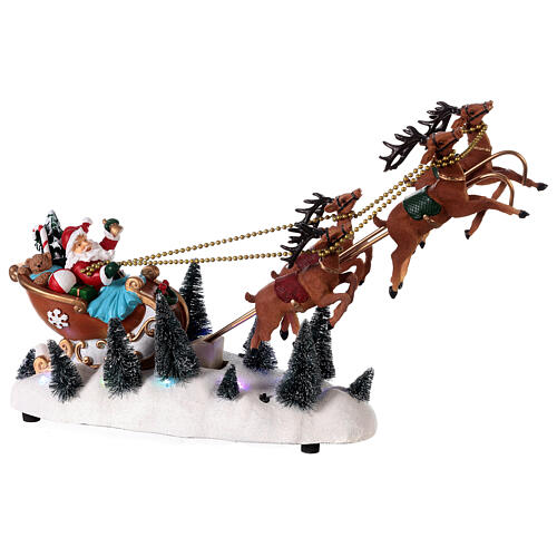 Snowy Santa's sleigh with flying reindeers, LED lights, 35x45x15 cm 4