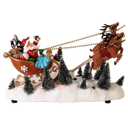 Snowy Santa's sleigh with flying reindeers, LED lights, 35x45x15 cm 3