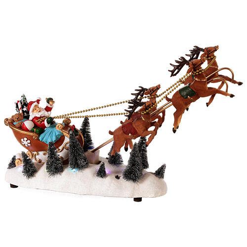 Snowy Santa's sleigh with flying reindeers, LED lights, 35x45x15 cm 6