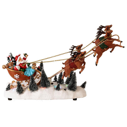 Slitta Babbo Natale neve renne volanti luci led 35x45x15 cm 1