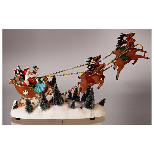 Slitta Babbo Natale neve renne volanti luci led 35x45x15 cm 2