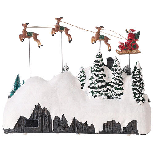 Snowy Christmas village with Santa sleigh animated LED lights 30x35x18 cm 5