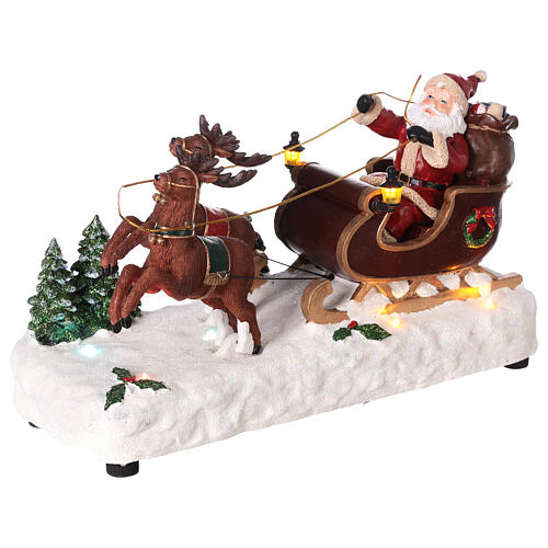 Santa's sleigh with snow and reindeers in motion, LED lights, 15x25x10 cm 3