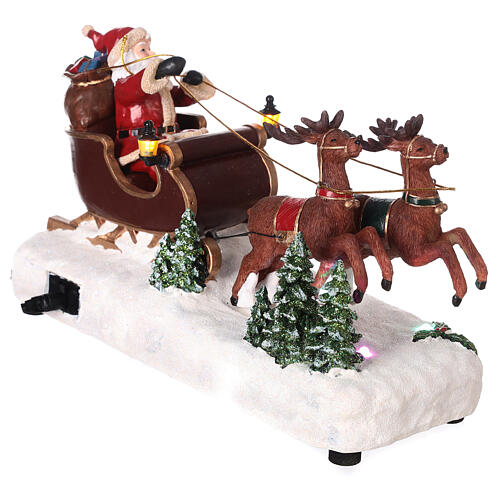 Santa's sleigh with snow and reindeers in motion, LED lights, 15x25x10 cm 4