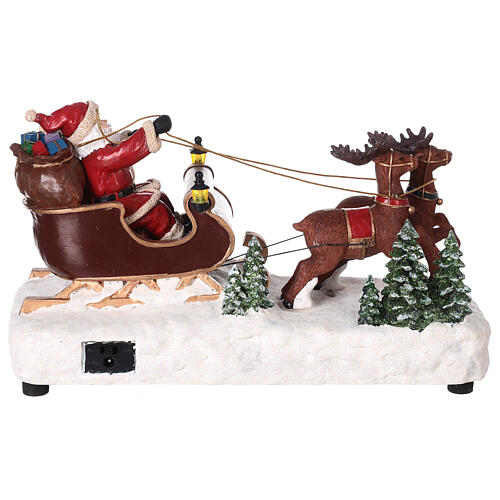 Santa's sleigh with snow and reindeers in motion, LED lights, 15x25x10 cm 5