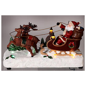 Slitta babbo natale neve renne movimento luci led 15x25x10 cm 