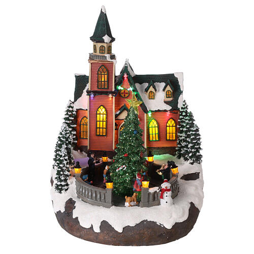Christmas village with snow, church and animated Christmas tree, LED lights, 35x25x30 cm 1