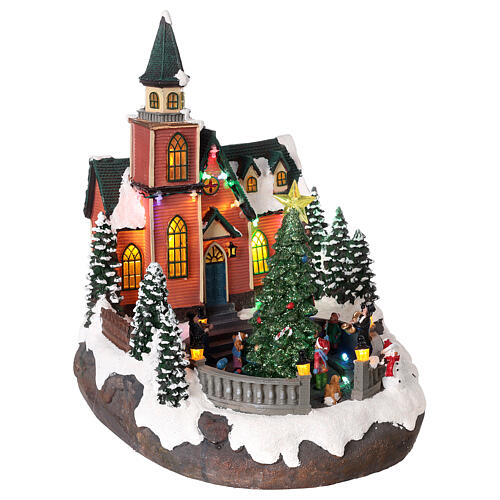 Christmas village with snow, church and animated Christmas tree, LED lights, 35x25x30 cm 4