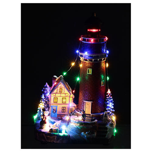 Christmas village with snow, church and animated Christmas tree, LED lights, 35x25x30 cm 8